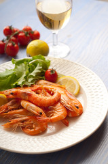 shrimp and salad with glass of wine