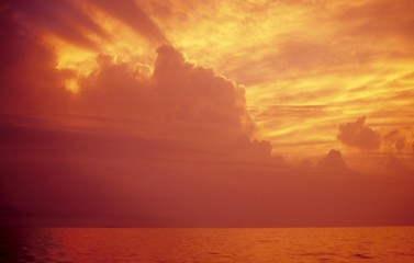 golden sunset in orange color in the sea ocean