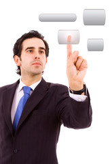 young business man pressing a touchscreen button, isolated in wh