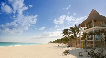 Gordijnen Caribbean sand beach tropical houses in Mexico © lunamarina