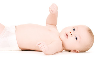 laying baby boy in diaper