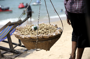 woman hawker sells peanut