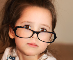 Little girl in glasses