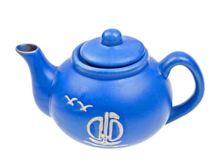 Close-up blue ceramic teapot  isolated on white