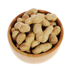 peanuts in a wooden mortar