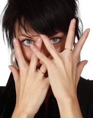 girl hiding behind hands