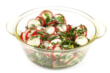 Radish salad with greens, seasoned with vegetable oil