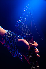 closeup hand with guitar