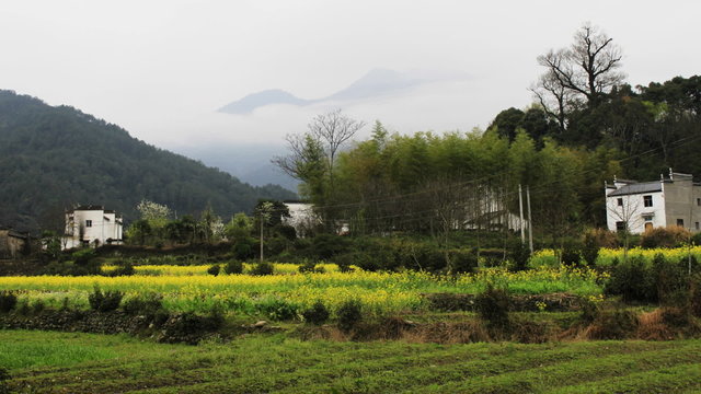 beautiful old village in China, timelapse of cloud passing by