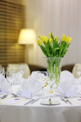 Empty place cards on the festive table