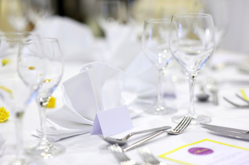 Empty place cards on the festive table