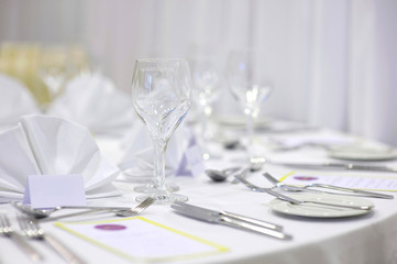 Empty place cards on the festive table