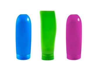 Three shampoo bottles