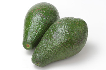 Green avocado isolated on white