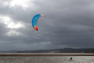 kitesurfer  in stormy weather
