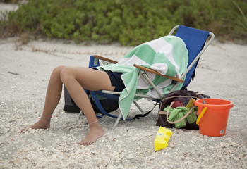 Girl Resting on Beach