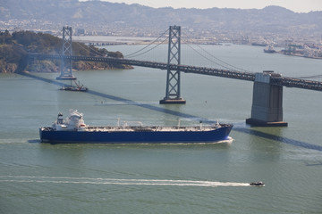 Cargo ship followed by pilot