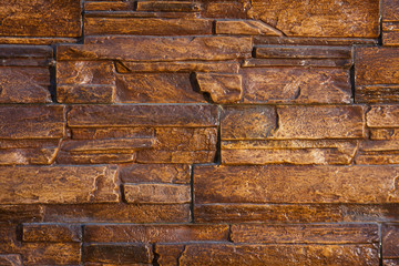 Stone wall texture from brown stones