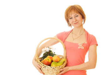 Red-haired caucasian woman with fruits