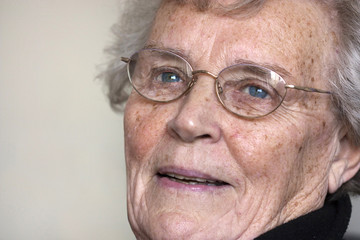 elderly woman gazing and smiling