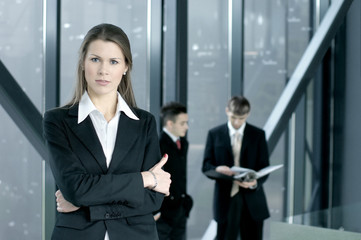 Fototapeta premium Portrait of a business team with a young woman in charge