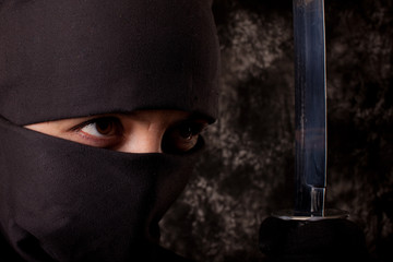 woman in shinobi suit © Sergey Lukianov