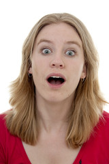 Young woman is looking surprised over white background