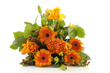 Bouquet of orange flowers over white background