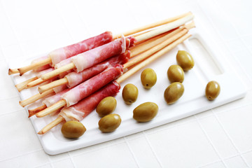 grissini with ham and olives