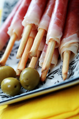 grissini with ham and olives