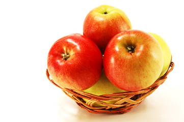 Apples in a wicker vase