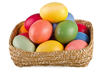 Obraz na płótnie Canvas Basket with eggs, on a white