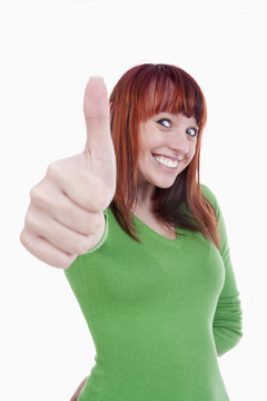 woman showing thumbs up