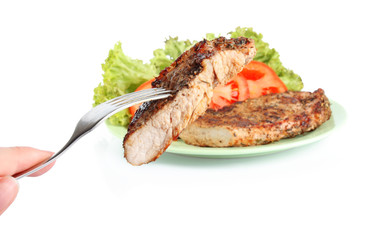 Steak on fork