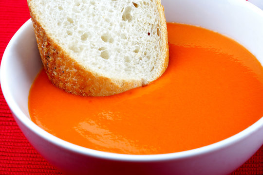 Bowl of Tomato Soup with White Bread