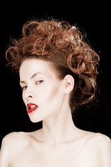 Fototapeta premium young woman with curly hairstyle
