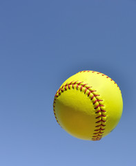 Yellow Softball in the Air