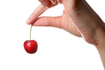 Woman Holding a Cherry. Model Released