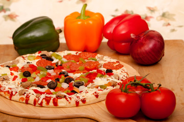 Fresh italian pizza and vegetables
