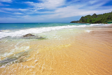 Tropical beach under blue sky. Thailand