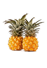 pair pineapple cut on a white
