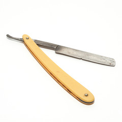 Old razor isolated over white