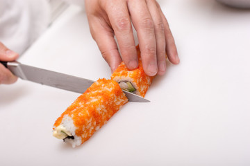 california roll cooking, cutting of roll