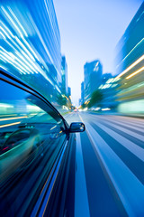 The car moves at great speed at the night.