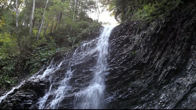 Waterfall Huk Zhenetsky in the Carpathians Mountains