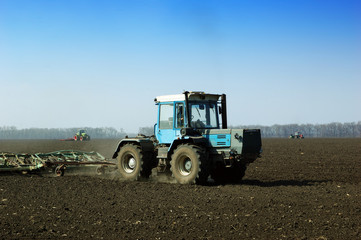 Fototapeta premium Tractor in The Field