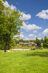 The Hamlet houses behind a lake of Versailles Chateau