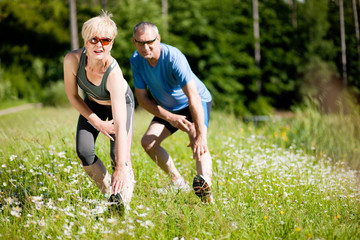 Senior couple doing sport outdoors