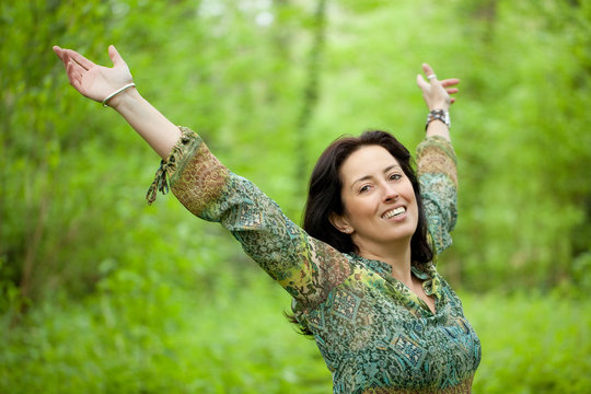 woman in green forest