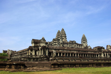 Wide corner view of Angkor Wat temple with a blue sky